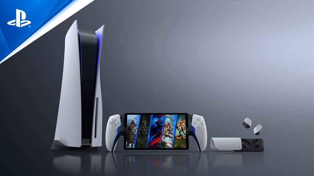 A PlayStation 5, handheld and accessories on a grey backdrop